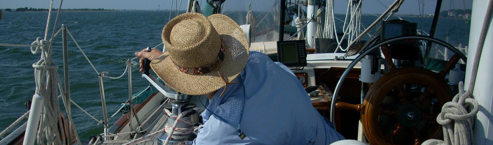 photo of artist's father at the helm